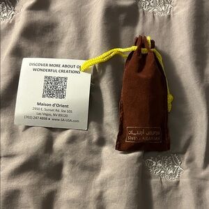 Swiss Arabian Brown perfume with Velvet Pouch
